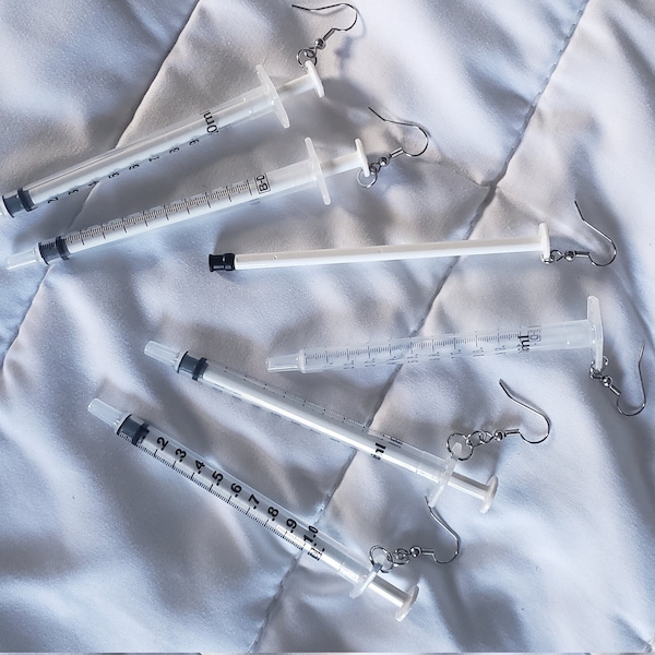 Syringe dangle earrings