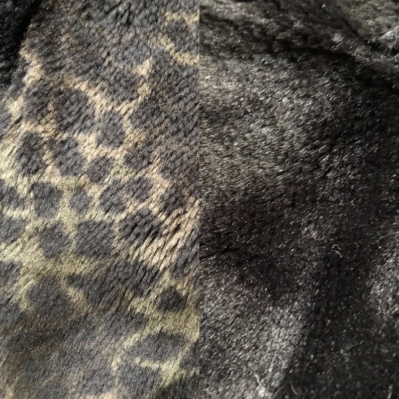 May include: Close-up of a black and brown faux fur fabric with a leopard print pattern.