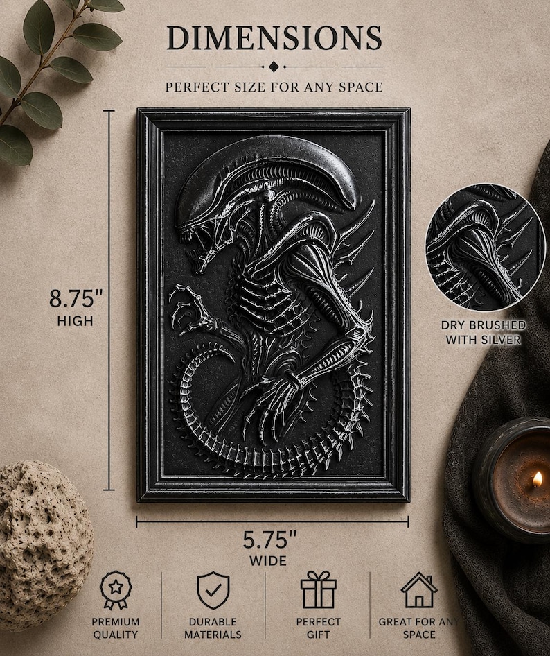 May include: Black framed wall art featuring a detailed relief of an alien creature. The artwork is 8.75 inches high and 5.75 inches wide. The text "DIMENSIONS" and "PERFECT SIZE FOR ANY SPACE" are at the top. The artwork is dry brushed with silver.