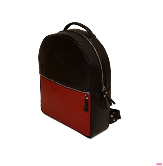 red faux leather backpack