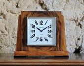 Art deco mantel 1930s clock quot CHARVET LYON quot , square shape, walnut wood veneer, silver dial, and blued hands.