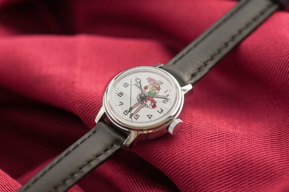 Vintage animated mechanical French 70s watch, gold