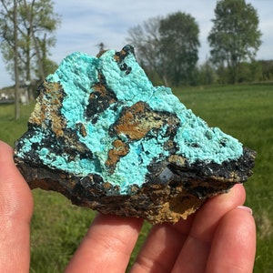 CHRYSOCOLLA-This stunning specimen features Neon Blue Chrysocolla sourced from Gemarska Poloma, Śramky,