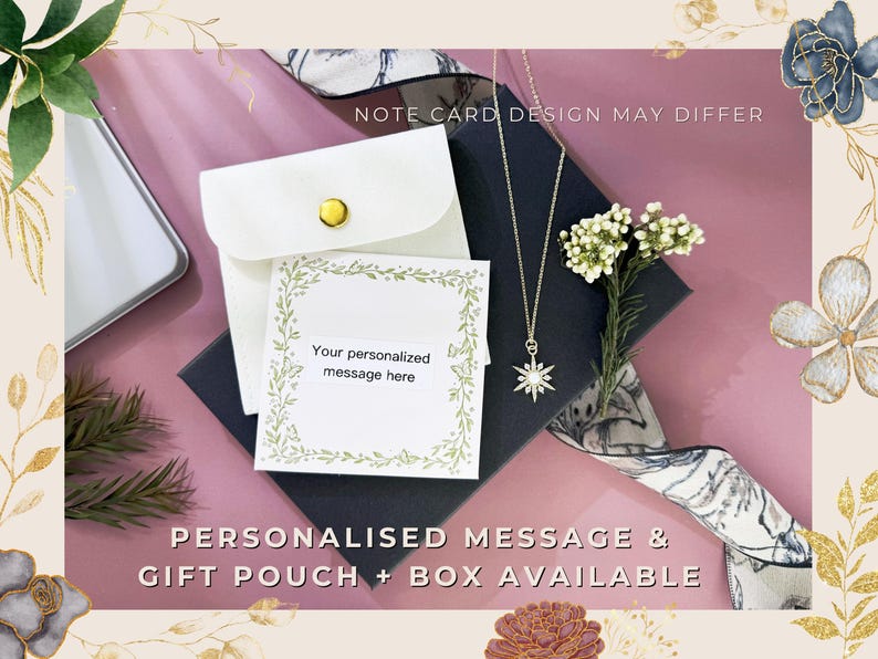 May include: A gold-colored necklace with a starburst pendant is displayed on a dark blue box, next to a white gift pouch and a card with the text "Your personalized message here." The image includes the text "NOTE CARD DESIGN MAY DIFFER" and "PERSONALISED MESSAGE & GIFT POUCH + BOX AVAILABLE."