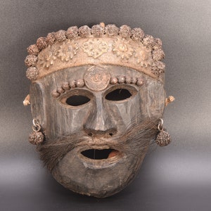 タルー族のシャーマンの悪魔払いのマスク、手彫りのネパール部族の