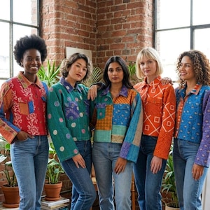 May include: Five individuals wearing cropped, long-sleeved jackets made from colorful, patterned quilted fabric. Each jacket features a button-up front, a collar, and two chest pockets, with distinct geometric and floral prints in red, green, blue, and orange.