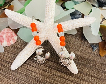 Small tangerine lampwork goldfish bead earrings adorned with tangerine Chinese crystal beads.