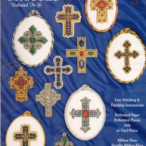 May include: A collection of nine cross-stitch patterns for ornaments. Each pattern features a different design of a cross with various colors and details. The patterns are titled "Historic Crosses" and are from "Designing Women Unlimited" number 56.