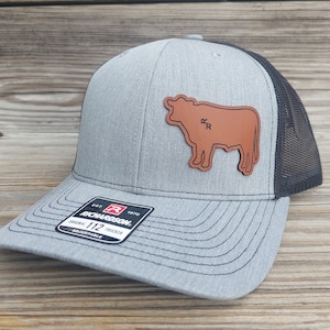 Your custom brand Cow style Leather Ear Tag Trucker Hat Personalized with Your Unique Brand on the Cattle Tag Richardson 112 yupoong 6606