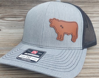 Your custom brand Cow style Leather Ear Tag Trucker Hat Personalized with Your Unique Brand on the Cattle Tag Richardson 112 yupoong 6606