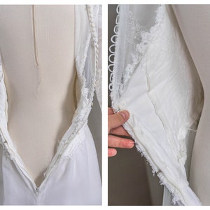 May include: White wedding dress with a lace bodice and a long skirt. The dress has a zip at the back and a lace overlay.