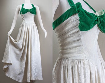 Elegant 40s White Satin Brocade Halter Evening Gown with Green Velvet Bow, Full A-line Skirt