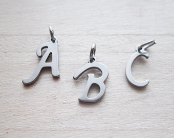 Stainless steel charms pendant alphabet initial A-Z with eyelet jewelry pendant steel color letter as desired