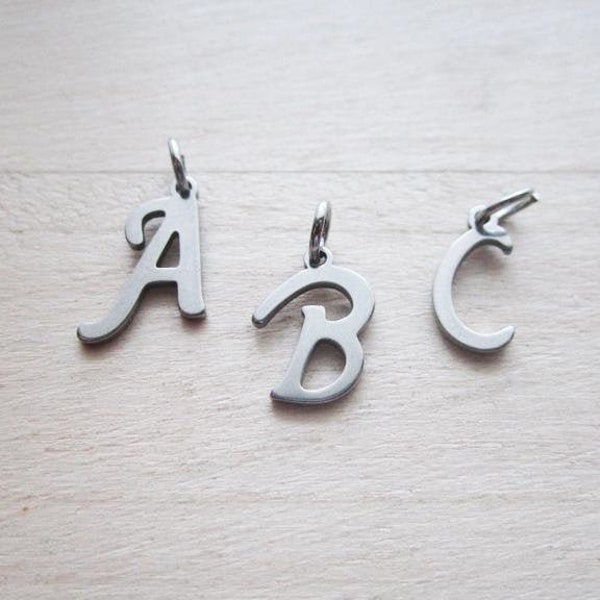 Stainless steel charms pendant alphabet initial A-Z with eyelet jewelry pendant steel color letter as desired