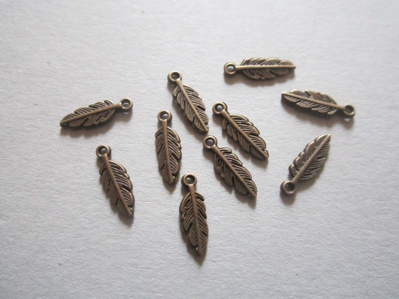 10x feather pendants 15 mm 7 colors to choose from Antikbronze