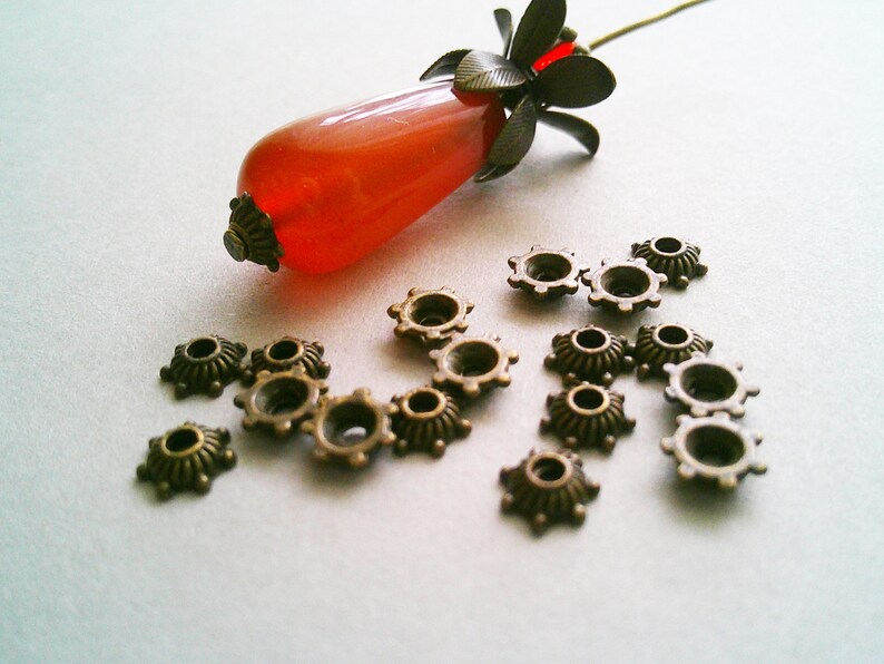 50x Perlenkappen Blume 5 mm x 2 mm Antikbronze Bild 1