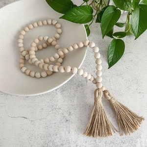 Cream Wood Bead Garland: Rustic Boho Decor, 62&quot; Tassel