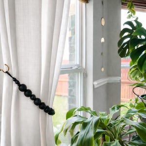 black curtain tiebacks