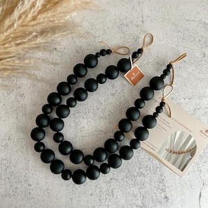 black curtain tiebacks