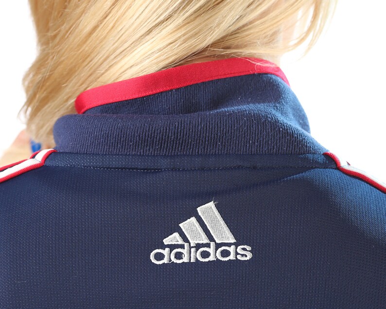 navy blue and red adidas jacket