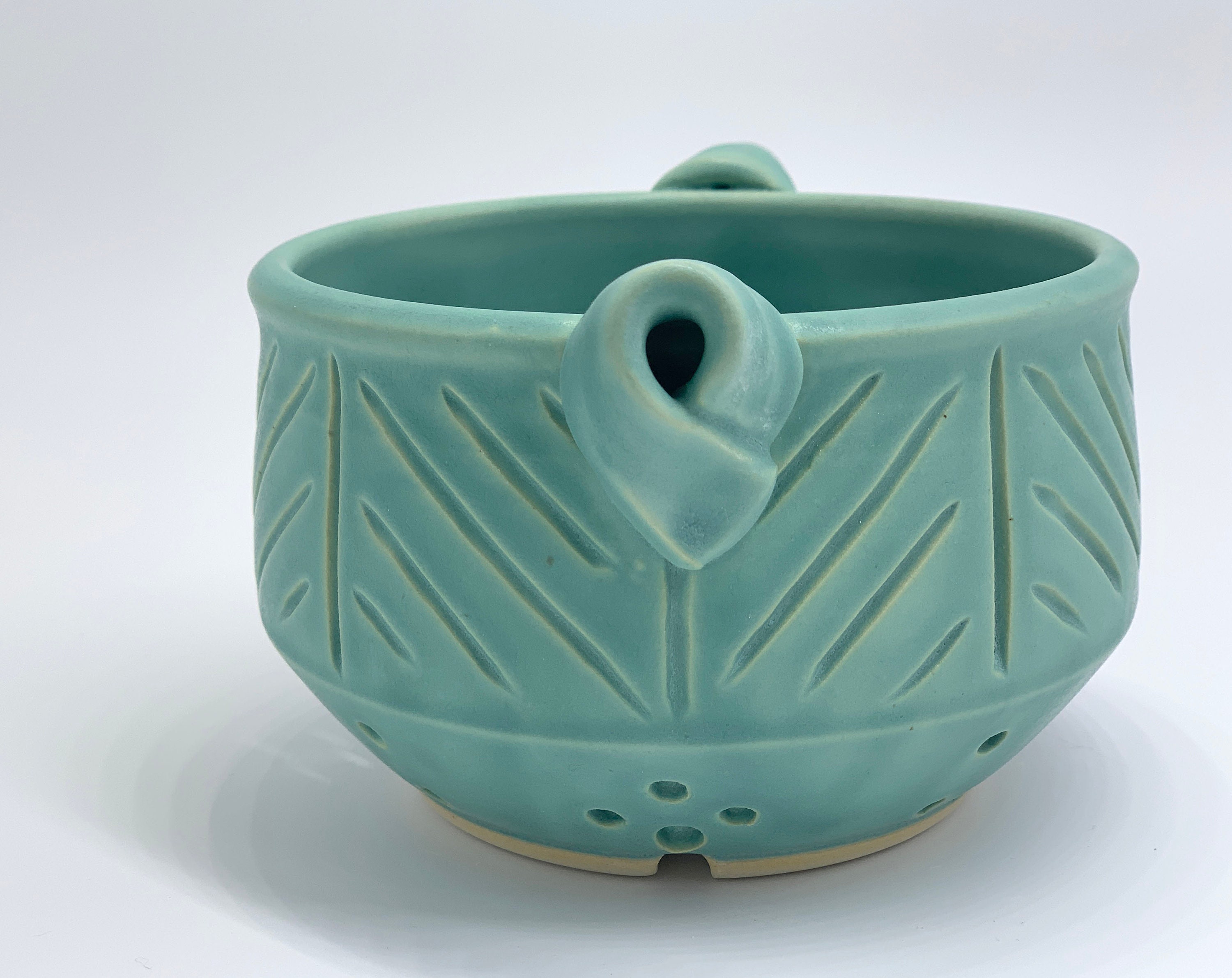 Soft Green Berry Bowl pottery for rinsing and draining grapes