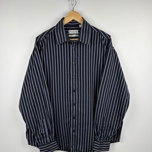 Playera ysl hombre store