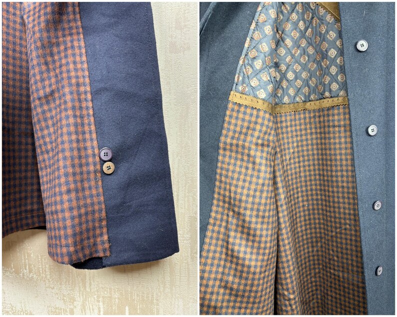 May include: A navy blue blazer with a brown and black checkered lining. The lining is visible on the inside of the jacket and on the sleeve cuffs.