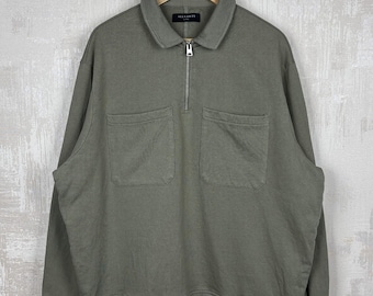 Sudadera polo AllSaints Jaxon con media cremallera, talla L para hombre, corte oversize (equivale a una XL).