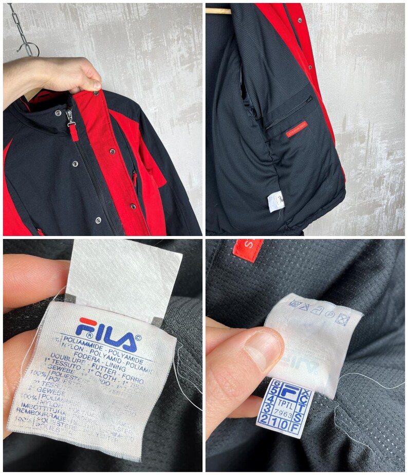 May include: Black and red Fila jacket. The jacket has a black body with red accents on the shoulders, sleeves, and collar. The jacket has a zipper closure and multiple pockets. The Fila logo is visible on a tag.