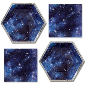 May include: A set of party supplies featuring a celestial theme. The image shows two hexagonal plates and two square napkins. The plates have a silver trim and a dark blue background with white stars. The napkins have a similar design.