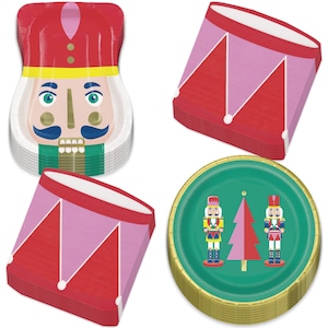 May include: A set of 10 red and pink paper plates with a nutcracker and drum design. The plates feature a green background with a gold rim.