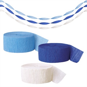 May include: Three rolls of crepe paper streamers in blue, light blue, and white. The streamers are curled and ready to be hung for a party or celebration.