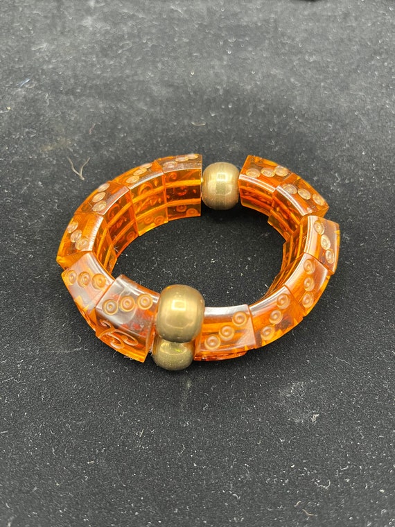 Bakelite root beer and brass bangle