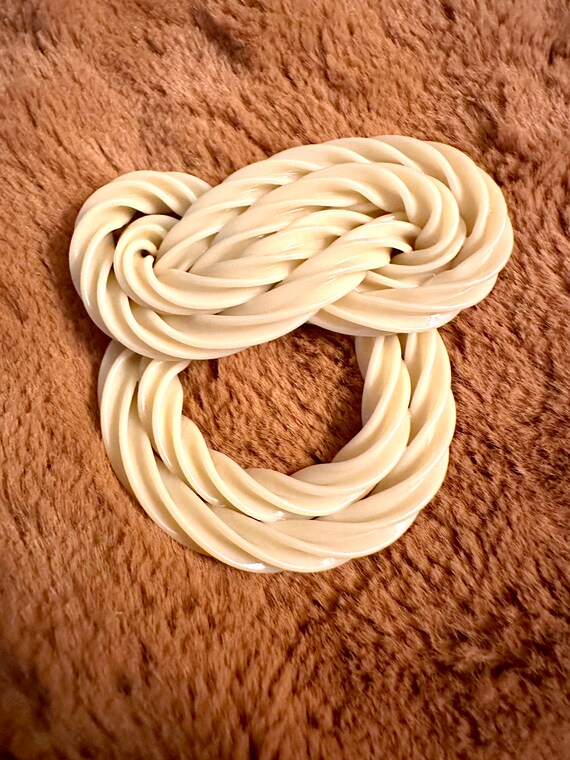 Celluloid Knot Brooch - image 1