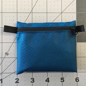 Monedero/caja ultraligero