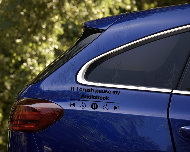 May include: A blue car with a black decal that reads "If I crash pause my Audiobook" with media control icons. The car's taillight is visible.