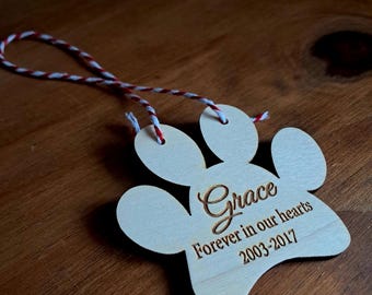 Personalised customised engraved wooden paw print shape, in memory of pets, memorial gift