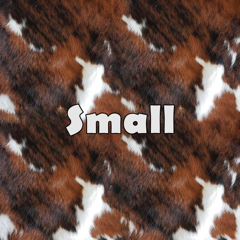 May include: A close-up of a brown and white cowhide pattern with the word "small" printed in white letters.