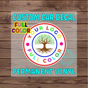 May include: Custom car decal with a circular design featuring a tree graphic. The decal includes the text "YOUR LOGO" and "FULL COLOR" in a vibrant color scheme. The words "PERMANENT VINYL" are also displayed.