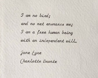 Charlotte Brontë quote typed on a vintage typewriter - I am no bird; and no net ensnares me (Jane Eyre)