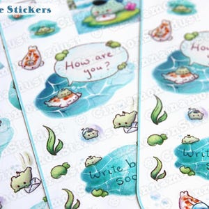 May include: A sheet of matte stickers featuring cute cartoon fish, plants, and speech bubbles with the text "How are you?" and "Write back soon".