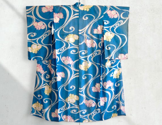 See Through Turquoise Blue Flowing Water and Floral Antique