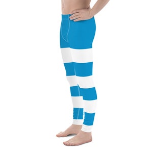 May include: Blue and white striped leggings. The leggings have a wide horizontal stripe pattern.