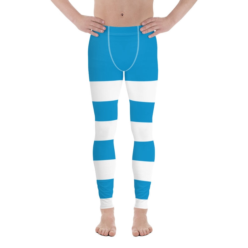 May include: Blue and white striped leggings. The leggings have a wide white stripe at the top of each leg and then alternate between blue and white stripes down the legs.