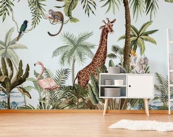 May include: A wall mural featuring a jungle scene with a giraffe, a pink flamingo, a monkey, and a bird against a light blue background. A white cabinet with open shelves sits in front of the mural, holding small gray and white storage containers.