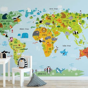 May include: A wall mural featuring a colorful world map on a light blue background. The continents are illustrated with various animals, trees, and ocean life. Text labels include North America, South America, Africa, Eurasia, Australia, and Antarctica.