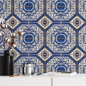 May include: A wall of blue and white patterned tiles with a floral design. The tiles are arranged in a repeating pattern. A black vase with cotton stems, a silver container, and a book are in the foreground.