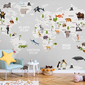 May include: A gray world map wall mural with illustrated animals and continents. Includes a giraffe, chair with a star pillow, and other decorative items. The map features the text "ARCTIC OCEAN", "ATLANTIC OCEAN", "PACIFIC OCEAN", "INDIAN OCEAN", and "SOUTHERN OCEAN".