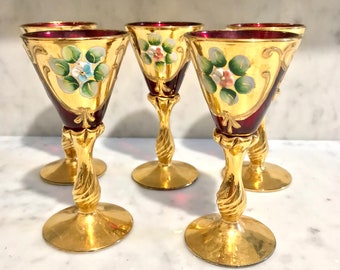 Set of 5 original Venetian Murano Tre Fuocchi port wine glasses in ruby red, 24kt gold-plated and enameled. Genuine vintage handcrafted pieces!