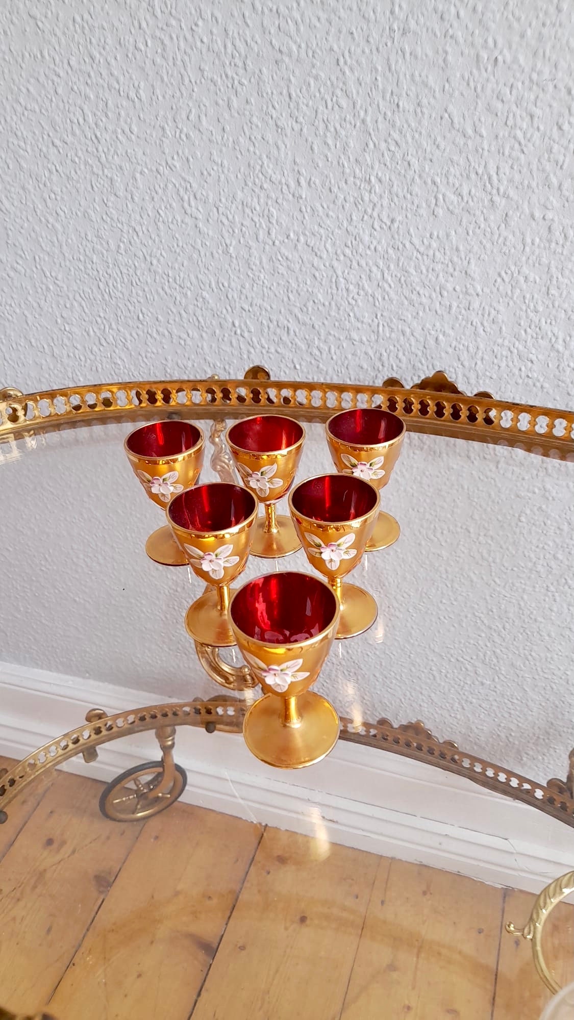 Set of 6 original Venetian Murano Tre Fuocchi Port wine glasses in ruby red 24kt gold plated and enamelled. Real vintage handwork!